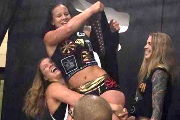 Former UFC Fighter Wins AIW Women’s Title, Ronda Rousey Appears (Video)