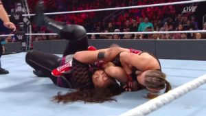 Ronda Rousey Retains RAW Women’s Title At WWE TLC