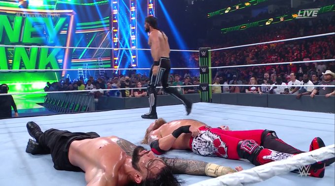 Roman Reigns Beats Edge With Help From Seth Rollins At WWE Money In The Bank