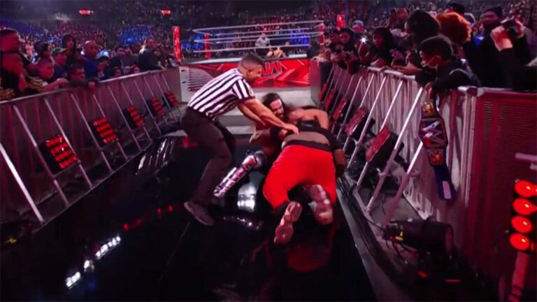 Watch: Seth Rollins Attacked By Fan On WWE Raw