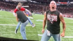 Goldberg Unleashes Signature Spear on Tom Brady Fan During NFL Game