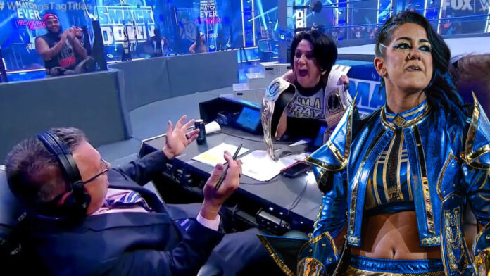 Bayley and Michael Cole