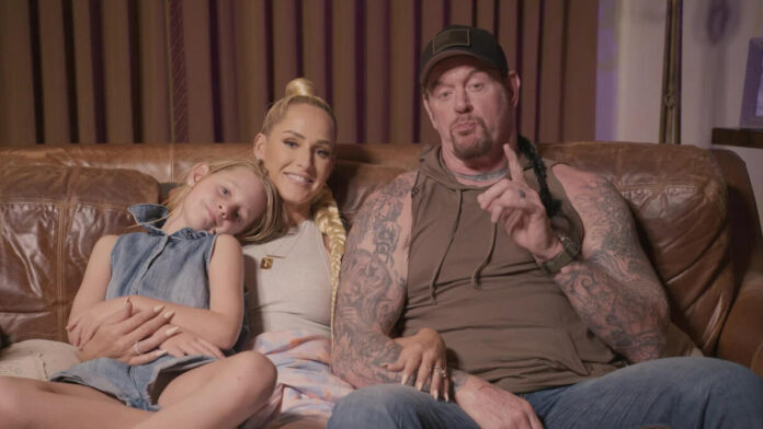 Undertaker with Michelle McCool and their daughter. Photo: WWE.com
