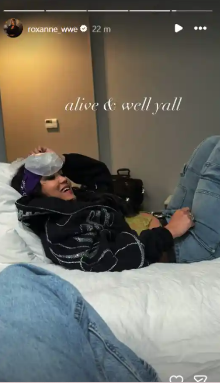 Roxanne Perez smiling while holding ice pack to her head in Instagram story update