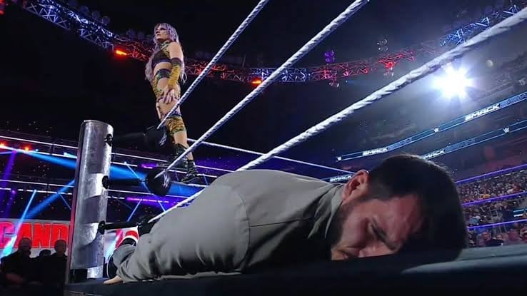 Johnny Gargano planking in the ring