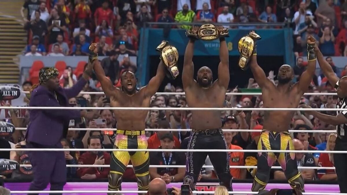 Kofi Kingston and Austin Creed as The New Level celebrate AEW World Trios title win at All In London