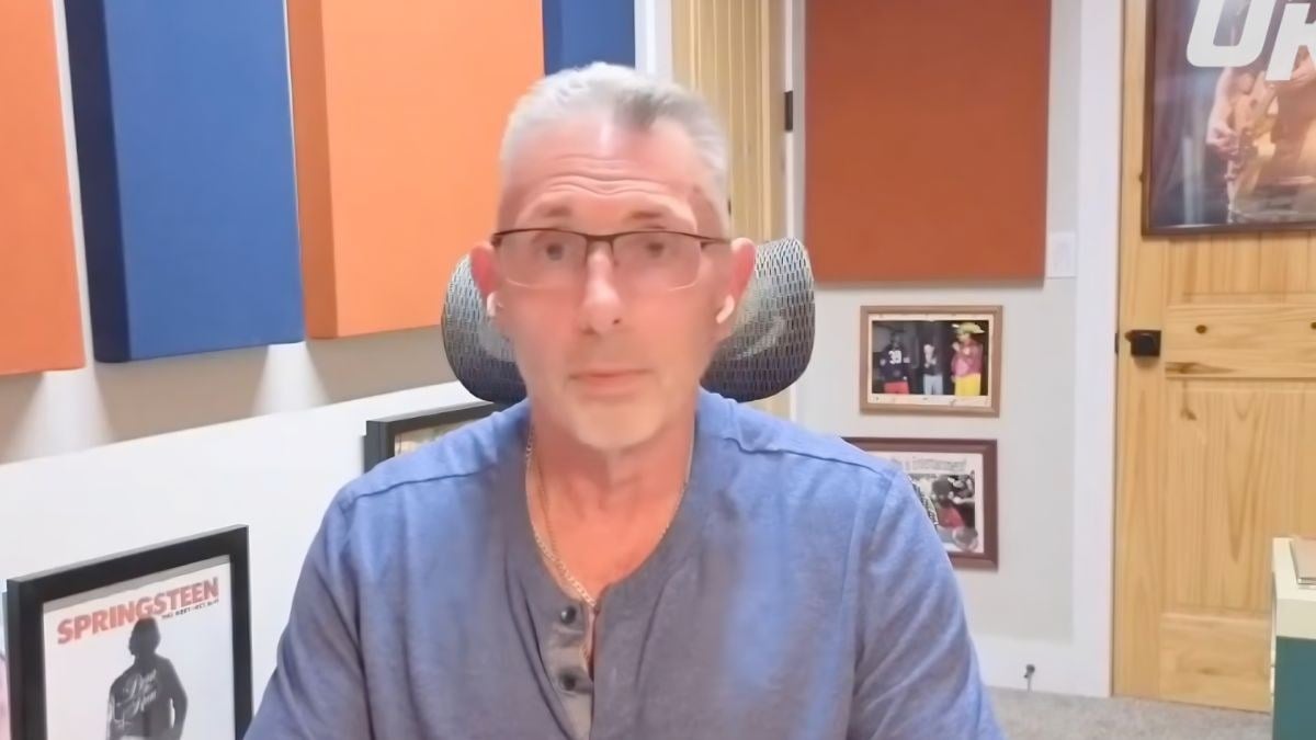 Michael Cole speaking on a video call from his home office during an OutKick interview