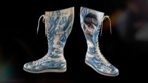 Hulk Hogan's signed blue-and-white flame boots from his WrestleMania X8 match against The Rock