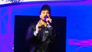 Max Caster rapping into a microphone during his TNA Bound for Glory entrance in Tampa