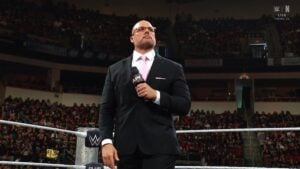 Adam Pearce in the Ring with Microphone