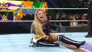 Liv Morgan celebrates winning the WWE Women's World Championship at Money in the Bank 2026