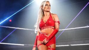Blake Monroe in red ring gear standing in a WWE ring