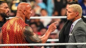 The Rock putting his finger in Cody Rhodes' face