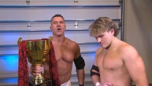 Frankie Kazarian holds the Call Your Shot trophy beside Avery Styles backstage at TNA Bound For Glory 2026