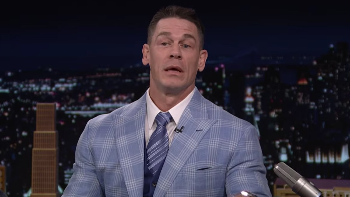 John Cena in a light blue plaid suit speaking on The Tonight Show Starring Jimmy Fallon