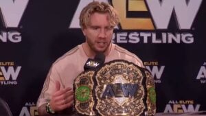 Will Ospreay speaking at an AEW press conference with the AEW World Championship belt